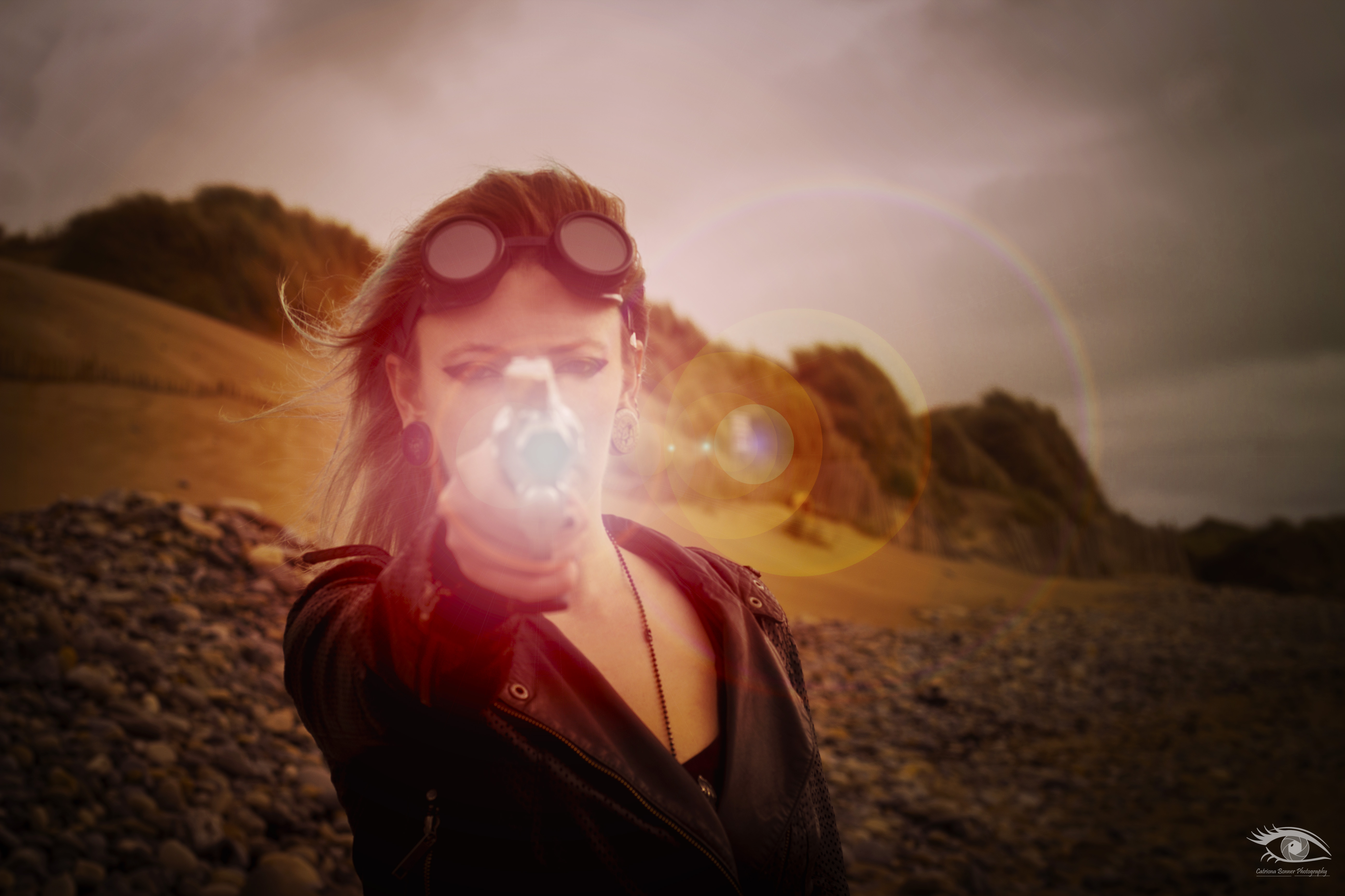 3 female figures stand looking forwards, shielding their eyes from the sun